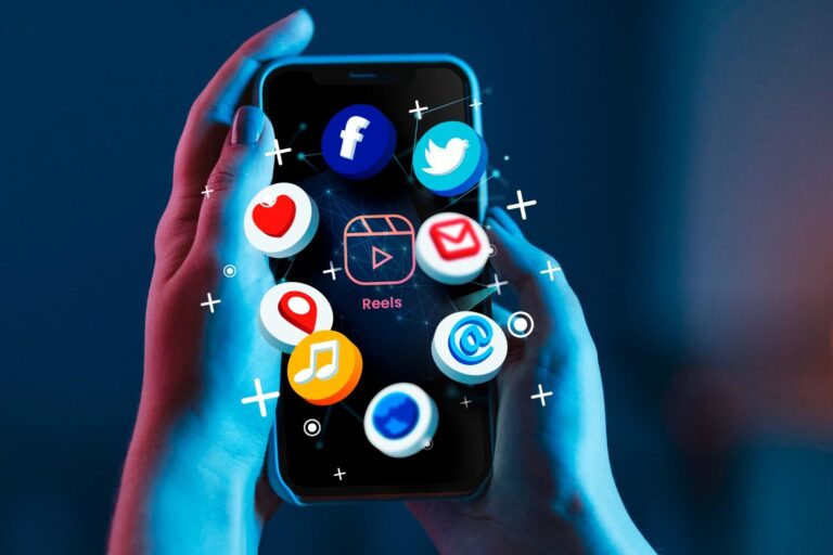 Digital marketer analyzing social media insights on laptop with colorful graphs and icons representing social media platforms.
