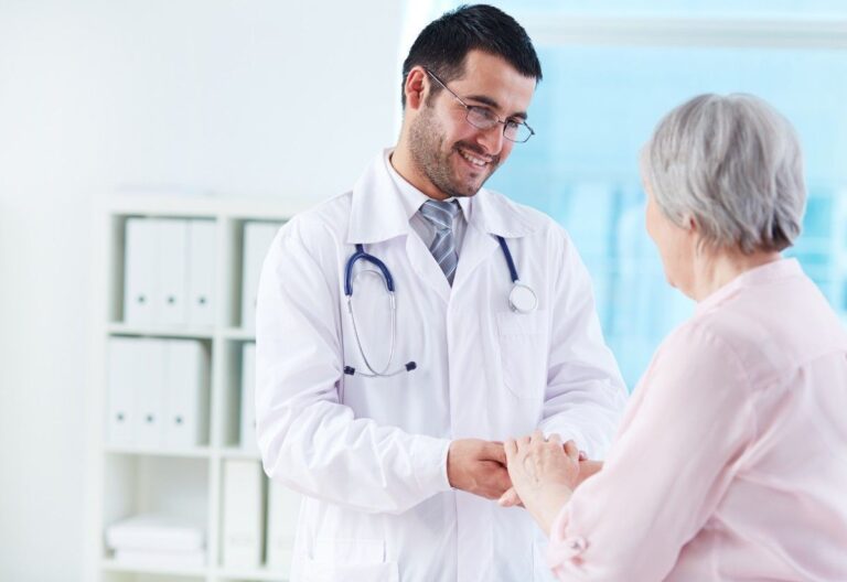 Doctor consulting and reassuring a senior patient, representing quality healthcare and Digital Marketing for Clinics in Ettumanoor to build patient trust and increase clinic appointments.